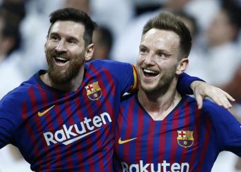 Barcelona’s Ivan Rakitic (R) and Lionel Messi celebrate after the former’s goal against Real Madrid in the La Liga game played Saturday