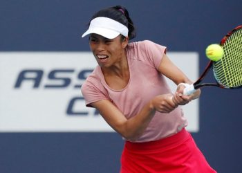Hsieh Su-wei plays a backhand during her match against Naomi Osaka in Miami, Saturday