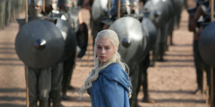 This image released by HBO shows Emilia Clarke in a scene from "Game of Thrones." The final season premiered Sunday. (HBO via AP)