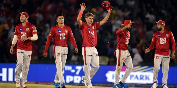 Sam Curran along with team members celebrates after their victory against Delhi Capitals at Mohali, Monday