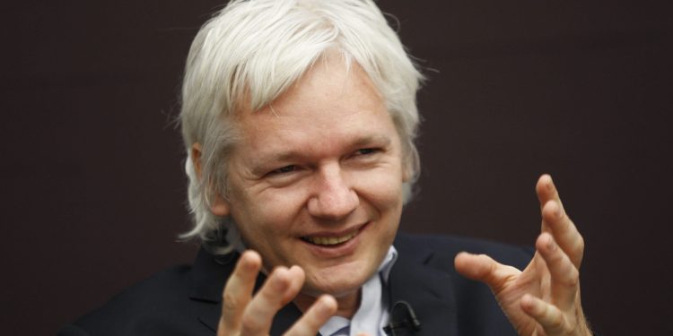 London: FILE - In this Dec. 1, 2011, file photo, WikiLeaks founder Julian Assange gestures as he speaks during a news conference in central London. The arrest of Assange reignites a debate with no easy answer: Is the former computer hacker and founder of WikiLeaks a journalist or not? His lawyers are quick to characterize the case against him as a threat to all journalists. (AP/PTI)