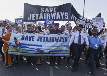 New Delhi: Jet Airways employees stage a protest over delay in their salaries at T-3 terminal of IGI Airport in New Delhi, Saturday, April 13, 2019. (PTI Photo/Atul Yadav)  (PTI4_13_2019_000095B)