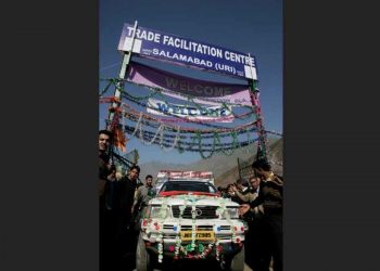 A vehicle begins driving to Pakistan-administered Kashmir during cross-border trade at Salamabad, 107km (66 miles) west of Srinagar, October 21, 2008. REUTERS/Danish Ismail/File Photo