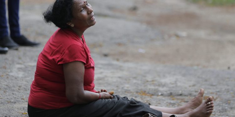 Colombo:  A relative of a blast victim grieves outside a morgue in Colombo, Sri Lanka, Sunday, April 21, 2019.  More than hundred were killed and hundreds more hospitalized with injuries from eight blasts that rocked churches and hotels in and just outside of Sri Lanka's capital on Easter Sunday, officials said, the worst violence to hit the South Asian country since its civil war ended a decade ago. AP/PTI(AP4_21_2019_000127B)