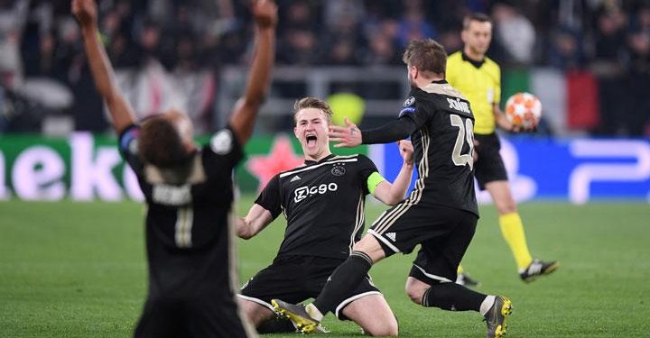 Ajax Amsterdam players celebrate their victory over Juventus in the Champions League quarterfinals, Saturday