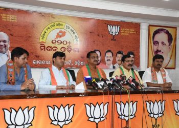 Vice-president of BJP’s Odisha unit Samir Mohanty addresses the press conference Wednesday as other leaders look on