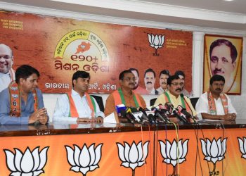 Vice-president of BJP’s Odisha unit Samir Mohanty addresses the press conference Wednesday as other leaders look on