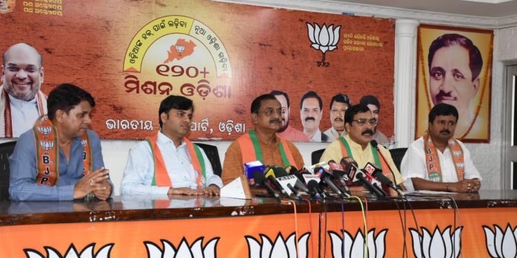 Vice-president of BJP’s Odisha unit Samir Mohanty addresses the press conference Wednesday as other leaders look on