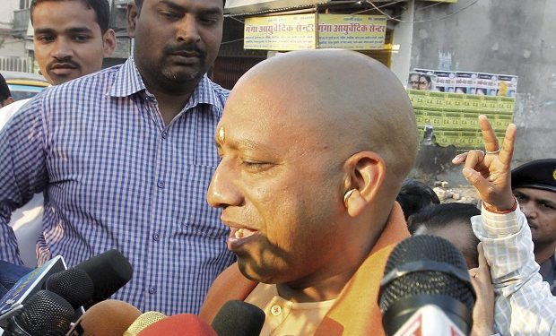 Gorakhpur: BJP MP Yogi Adityanath interacts with media after casting his vote during the sixth phase of the state assembly election in Gorakhpur. (PTI Photo)