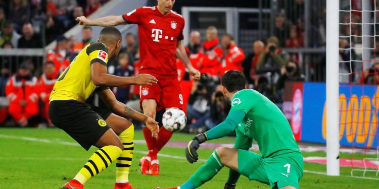 Bayern lead Dortmund by one point with six rounds remaining. (Image: Reuters)