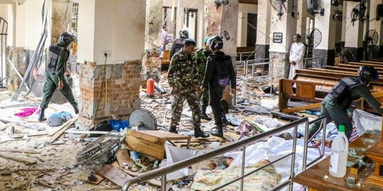 A total of 310 people were killed and over 500 injured in suicide bombings in three Sri Lankan cities Sunday.