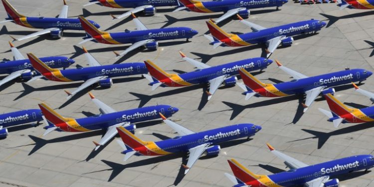 Southwest Airlines and other carriers face a challenging summer after the entire fleet of Boeing 737 MAX aircraft were grounded (AFP/File / Mark RALSTON)