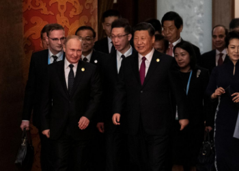 Russian President Vladimir Putin and Chinese President Xi Jinping arrive for a welcoming banquet at the Great Hall of the People in Beijing, China (File pic)