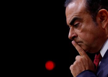 FILE PHOTO: Carlos Ghosn then Chairman and CEO of the Renault-Nissan Alliance, reacts during a news conference in Paris, France, September 15, 2017. REUTERS/Philippe Wojazer/File Photo