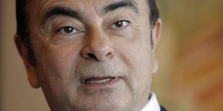 FILE - In this April 20, 2018, file photo, then Nissan Chairman Carlos Ghosn speaks during an interview in Hong Kong. Japan's court has denied the prosecutor's request to extend detention of ex-Nissan chair Carlos Ghosn. Ghosn, facing financial misconduct charges in Japan, says he will hold a news conference April 11. Ghosn said Wednesday on his new verified Twitter account he is getting ready to tell the truth. (AP Photo/Kin Cheung, File)