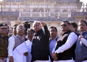 Rajasthan Chief Minister Ashok Gehlot with party workers (PTI photo)