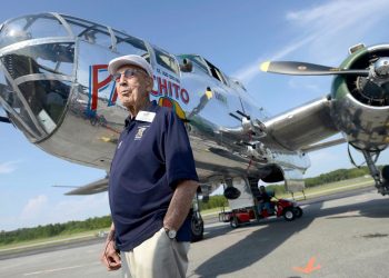 In this April 16, 2013 file photo, Doolittle Raider Lt. Col. Dick Cole, stands in front of a B-25 at the Destin Airport in Destin, Fla. before a flight as part of the Doolittle Raider 71st Anniversary Reunion. Retired Lt. Col. Richard "Dick" Cole, the last of the 80 Doolittle Tokyo Raiders who carried out the daring U.S. attack on Japan during World War II, has died at a military hospital in Texas. He was 103. A spokesman says Cole died Tuesday, April 9, 2019, at Brooke Army Medical Center in San Antonio, Texas. (Nick Tomecek/Northwest Florida Daily News via AP)