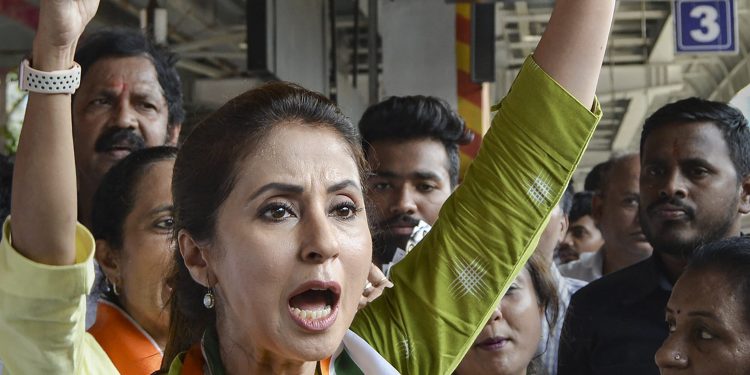 Mumbai: Bollywood actress and Congress candidate Urmila Matondkar campaigns for the Lok Sabha polls at Borivali Station, in Mumbai, Monday, April 15, 2019. (PTI Photo) (PTI4_15_2019_000057B)