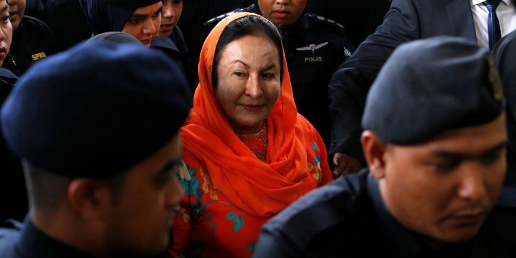 Malaysia's Rosmah Mansor faces coming out of a Kuala Lumpur court. (REUTERS)