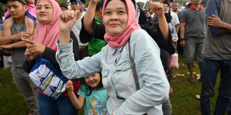 "I'm a Radja fan because their songs are great, but it's also because we're going to vote for the same candidate," a candidate said from the rally near the capital Jakarta. (AFP)