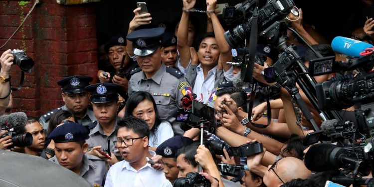 Detained Reuters journalists Wa Lone and Kyaw Soe Oo leave Insein court after listening to the verdict in Yangon. (Reuters photo)