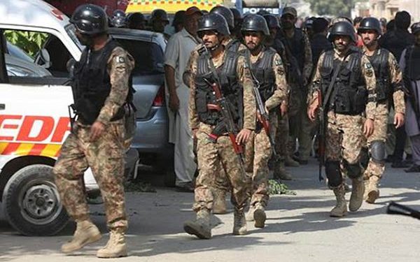 Unidentified gunmen donning uniforms of paramilitary soldiers Thursday massacred 14 passengers after forcing them to disembark from buses on a highway in the restive Balochistan province.