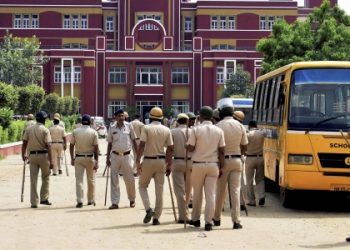 Police outside the school in Gurugram where a 7-year-old was found dead. (PTI photo)