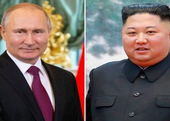 Vladimir Putin (L) and Kim Jong Un