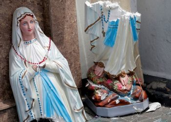 A statue of Virgin Mary broken in two parts seen at one of the churches where the explosions took place. (Image: Reuters)