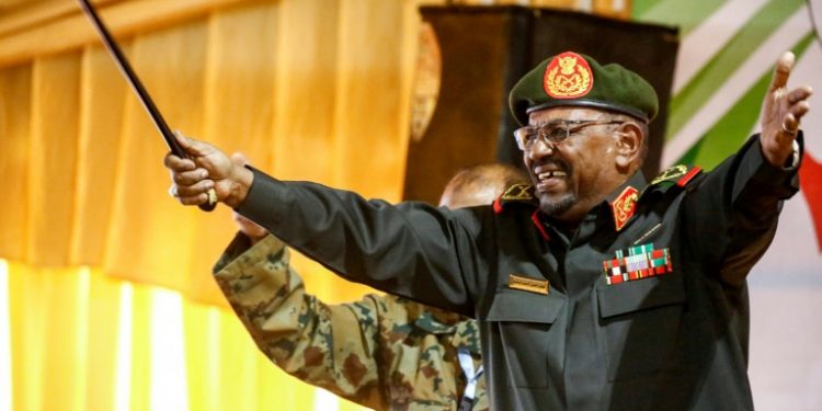 Sudan's Omar al-Bashir, seen here addressing supporters at a Khartoum rally before his ouster and detention by the army last week, ruled the country with an iron fist for three decades (AFP)