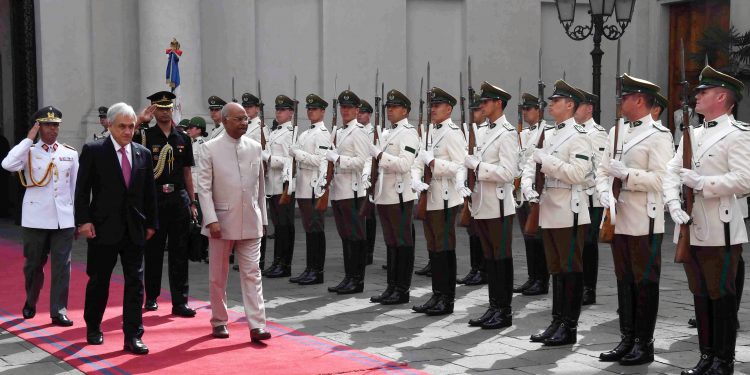 Santiago: President Ram Nath Kovind inspecting the Guard of Honour along with his Chilean counterpart Sebastian Pinera during a welcoming ceremony at La Moneda presidential palace in Santiago, Chile, Monday, April 1, 2019. (RB Photo/PTI)