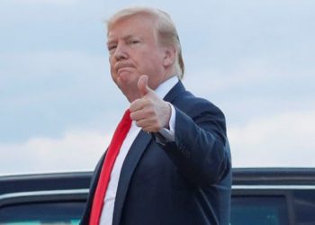 President Donald Trump gives a 'thumbs-up' as he walks across the tarmac during his arrival on Air Force One, Sunday, April 21, 2019, at Andrews Air Force Base, Md. (AP Photo/Pablo Martinez Monsivais)