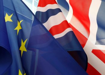 The flags of Britain (R) and the European Union flutter in front of the Chancellery in Berlin (AFP)