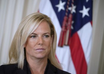 Kirstjen Nielsen, pictured in October 2017, listens as US President Donald Trump nominates her as US Secretary of Homeland Security (AFP)