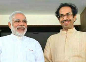 Narendra Modi (L) and Uddhav Thackeray. File pic