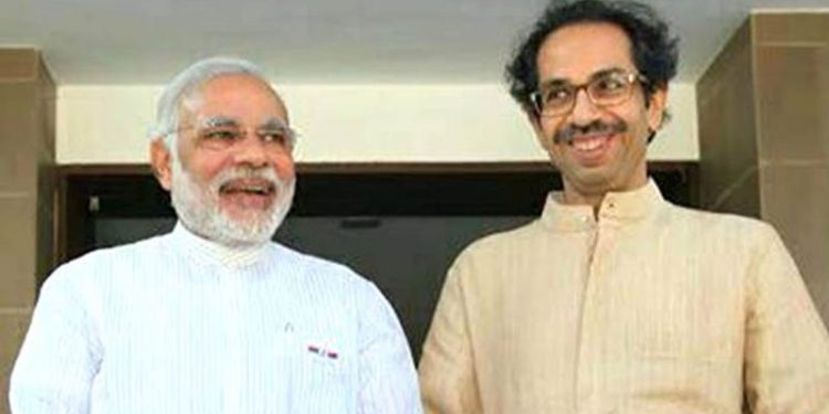 Narendra Modi (L) and Uddhav Thackeray. File pic