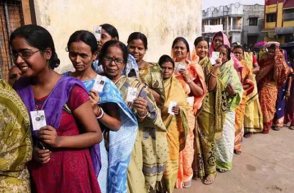 Voters queue up at a polling station in West Bengal