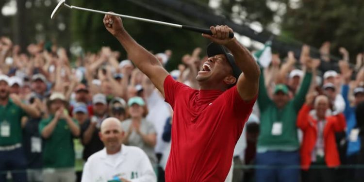 Woods persevered on a tense back nine at Augusta National, winning by one stroke after birdies at 13, 15 and 16. (Image: Reuters)