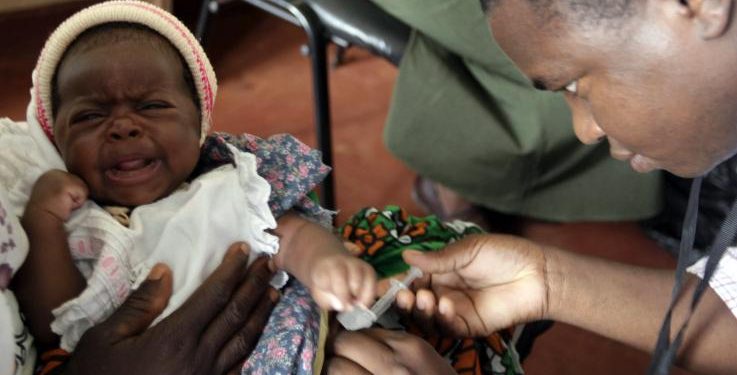 A child is given an injection as part of a malaria vaccine trial at a clinic in the Kenya coastal town of Kilifi, November 23, 2010. More than 90 percent of the world's malaria deaths occur in sub-Saharan Africa.
JOSEPH OKANGA/REUTERS
