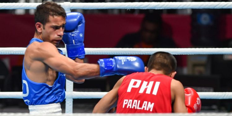 Amit Phangal (in blue) is one of the most prominent boxers in India