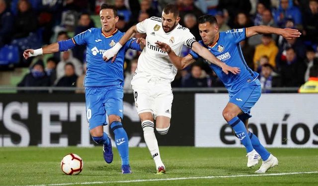Real Madrid were mathematically ruled out of the title race after Barcelona beat Alaves Tuesday.