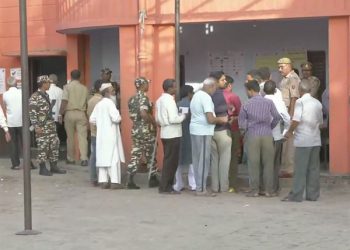 Polling in the presence of large number of security personnel in a booth in the Asansol Lok Sabha constituency