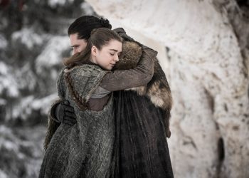 This image released by HBO shows Maisie Williams, left, and Kit Harington in a scene from "Game of Thrones," premiering on Sunday, April 14. The first episode of the final season of "Game of Thrones" is a record-breaker for the series and HBO. The pay channel said the 17.4 million viewers who watched Sunday’s episode either on TV or online represent a season-opening high for the fantasy saga. (Helen Sloan/HBO via AP)