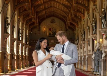 London:  Britain's Prince Harry and Meghan, Duchess of Sussex, during a photocall with their newborn son, in St George's Hall at Windsor Castle, Windsor, south England, Wednesday May 8, 2019. Baby Sussex was born Monday at 5:26 a.m. (0426 GMT; 12:26 a.m. EDT) at an as-yet-undisclosed location. An overjoyed Harry said he and Meghan are "thinking" about names. AP/PTI(AP5_8_2019_000082B)