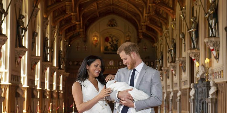 London:  Britain's Prince Harry and Meghan, Duchess of Sussex, during a photocall with their newborn son, in St George's Hall at Windsor Castle, Windsor, south England, Wednesday May 8, 2019. Baby Sussex was born Monday at 5:26 a.m. (0426 GMT; 12:26 a.m. EDT) at an as-yet-undisclosed location. An overjoyed Harry said he and Meghan are "thinking" about names. AP/PTI(AP5_8_2019_000082B)