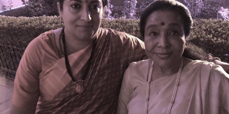 Bhonsle, who was attending the ceremony here Thursday, tweeted a photograph of herself with Irani.