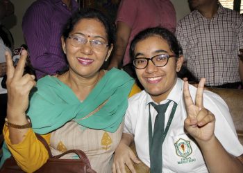 Ghaziabad: Hansika Shukla, CBSE class 12th topper, poses for a photograph with her mother after the results were declared, in Ghaziabad, Thursday, May 02, 2019. Shukla scored 499 out of 500 marks. (PTI Photo)(PTI5_2_2019_000037B)