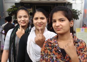 First time voters in Bhopal show their inked fingers after casting their votes, Sunday