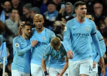 Manchester City’s Vincent Kompany, (2nd from left) celebrates with teammates after scoring against Leicester City, Monday