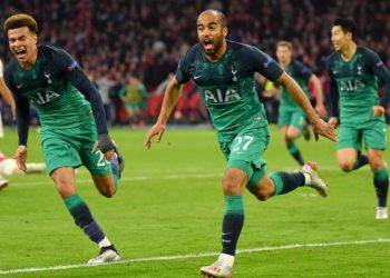 Lucas Moura (R) and Dele Alli of Tottenham Hotspur celebrate after the former’s third goal against Ajax Amsterdam, Wednesday in the Champions League semifinal